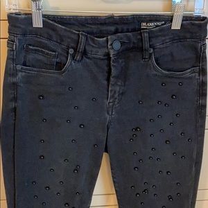 Black jeans with black pearls